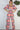 Weezie D. Playful Printed Jumpsuit in coral print. Our jumpsuit has an elastic sweetheart neckline. Wear to your captain's dinner on your upcoming cruise, bridal or baby showers, day parties or date.