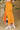 Weezie D. Tangerine Orange Slinky Skirt Set is a perfect vacation outfit or wear to those special occasion events. Great stretch and fits so perfectly on most. Slay your summer time style.