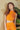 Weezie D. Tangerine Orange Slinky Skirt Set is a perfect vacation outfit or wear to those special occasion events. Great stretch and fits so perfectly on most. Slay your summer time style.
