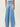 Weezie D light blue wash High Waist Distressed Wide Flood Denim Jeans are a MUST HAVE. Classic 5 pocket construction, hidden zip fly closure & belt loops. The thigh slit cuts add character to our denim. We love how the high waist fits with shorter length tops, t-shirts or tucked in blouse 57.8% Cotton 42.2% Gracell