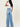 Weezie D light blue wash High Waist Distressed Wide Flood Denim Jeans are a MUST HAVE. Classic 5 pocket construction, hidden zip fly closure & belt loops. The thigh slit cuts add character to our denim. We love how the high waist fits with shorter length tops, t-shirts or tucked in blouse 57.8% Cotton 42.2% Gracell