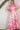Weezie D. Pink and Green Martini Maxi Dress has cutout waist, front tie and side pockets in our maxi shirt dress. Great for special occasions, summer weddings, bridal and baby showers or a night out.