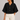 black dolman sleeve knit top with gold buttons front view
