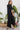 Black oversized maxi dress flowing silhouette side view