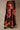 Back view of brown floral satin bias maxi skirt