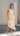 Front view of cream fringe sweater knit midi tank dress