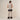 Back view of cream open-knit two piece pants set with scalloped trim