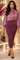 Front view of eggplant purple knit maxi skirt with asymmetrical waist overlay and gold buttons