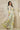 Side view of floral maxi dress with twist-front waist