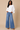 Front view of ivory tie back batwing sleeve top