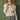 Ivory twist front off shoulder sweater in soft ribbed knit