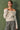 Ivory twist front off shoulder sweater in soft ribbed knit