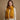 Mustard cashmere feel fringe wrap scarf styled around neck with ivory knit sweater