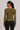 Back view of olive green ruched mesh long sleeve top with ruching and hidden zipper