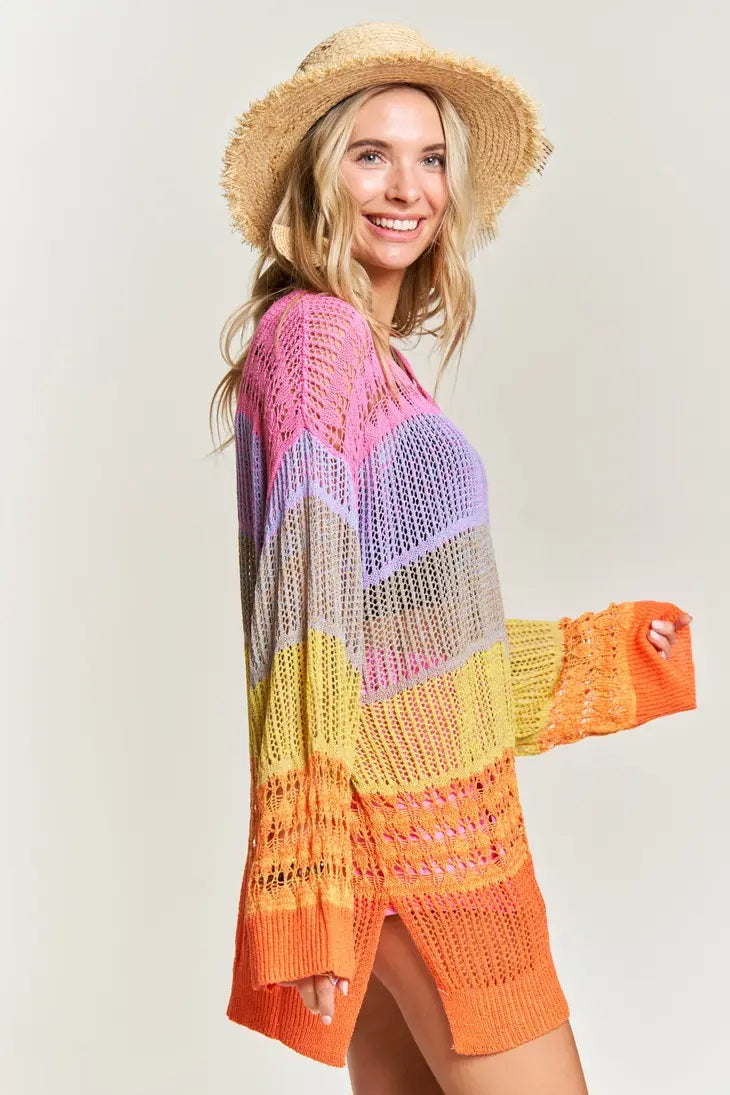 Weezie D. rainbow crochet tunic top has a colorblocking effect. Great to wear as a coverup for the beach. Slay the day beach babe. Wear over a tank dress tank tops as a beautiful layering top. Oversized top. 