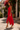 Side view of red fit-and-flare midi dress with flowing hem