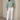 Front view of sage scalloped open knit bell sleeve sweater