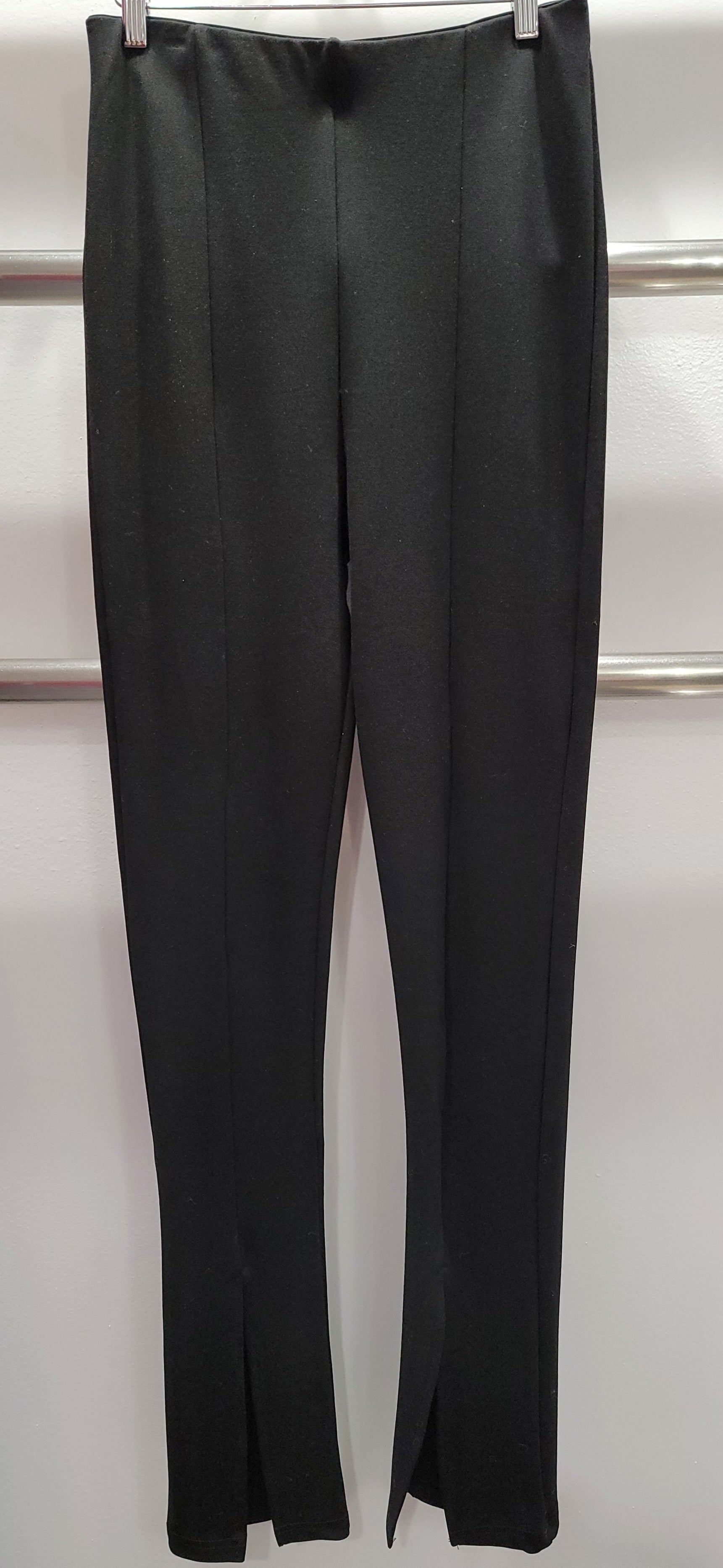 Weezie D. stretch pull up exaggerated high waist black leggings have an ankle slit front detail that make our leggings extra fabulous to wear. Elastic waist for comfort, stylish with dart front details for a seamless silhouette. Wear with tops, blazers, & even a fun t-shirt. 95% Polyester 5% Elastane offers a nice stretch fabric for our curvy women. 