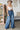 Weezie D. Tencel High Waist Wide Flood Pants has elastic 4" wide smocked waist band, loose relaxed stylish fit that can be worn with fun t-shirts, tops or even a tank. Featuring side pockets & an easy pull on style. Clean back finish for a more seamless look. 100% Tencel fabric is breathable, soft & high quality. 