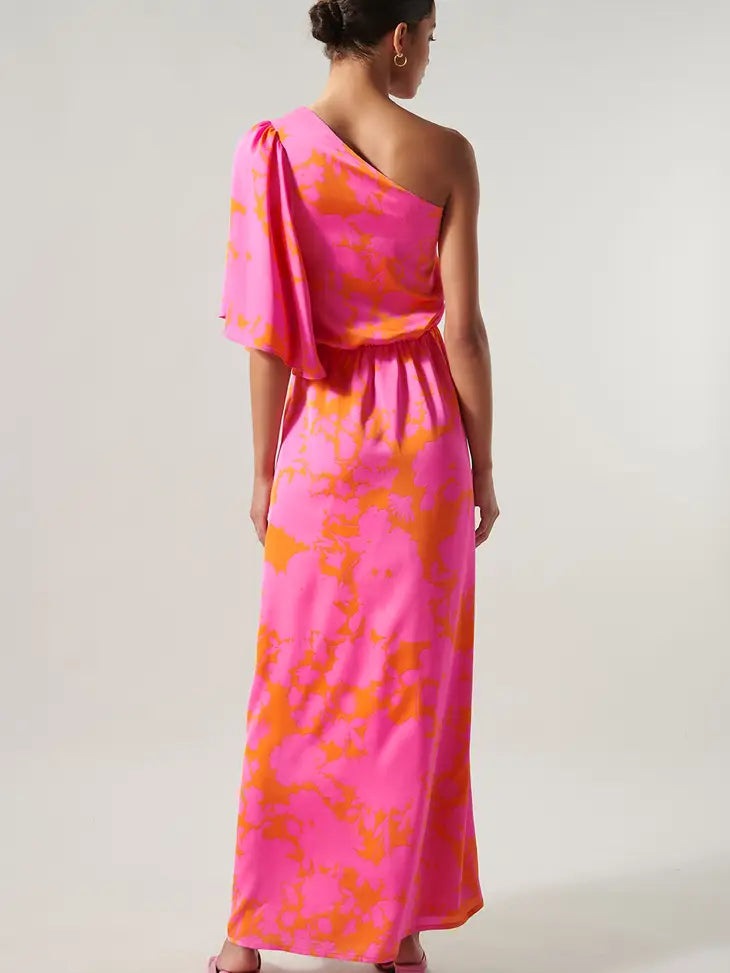 Weezie D Satin One Shoulder Maxi Dress is a silky romantic ultra feminine dress. Vibrant color of pink & orange print perfectly into this vacation ready or summer event look. One shoulder flouncy flutter sleeve & relaxed bodice flows into the elastic waist. Great for a wedding or dinner date Fully Lined 100% Polyester