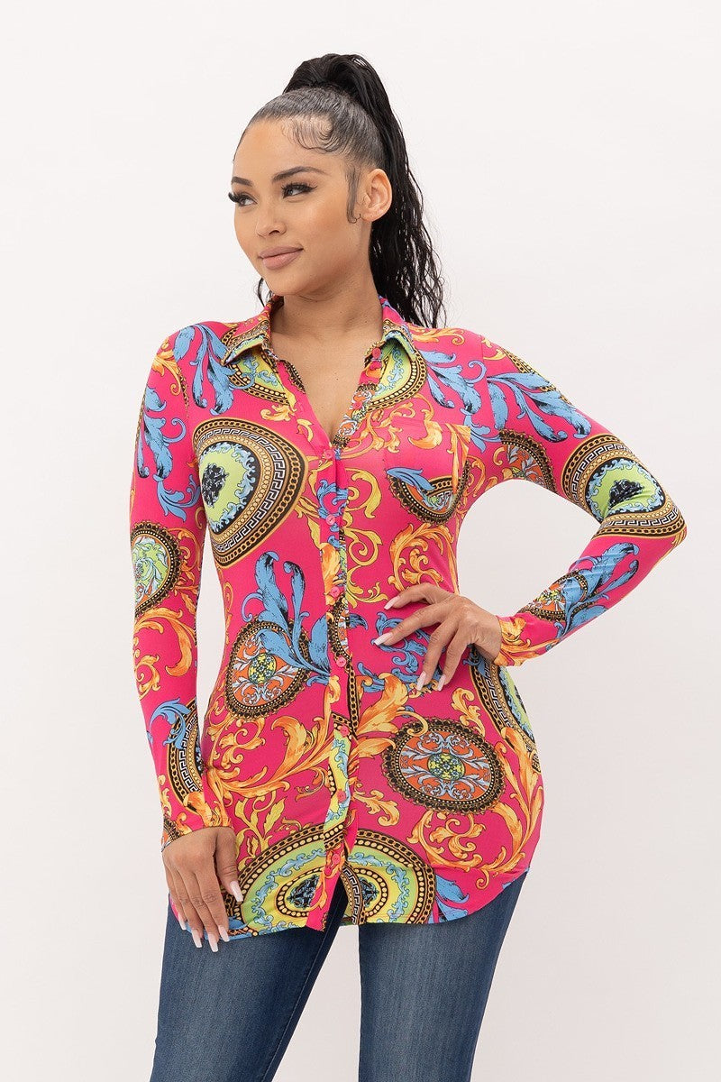 Weezie D. bright & pastel mix are in our Stretch Pink Printed Avant Garde Top. Unique printed top has long sleeves, button down closure, & spandex fabric mix is comfortable to wear & a good fit. The torso is thigh length for an easy tuck or leave outside of denim or pants of your choice. 96% Polyester 4% Cotton