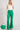 Weezie D Kelly Green Stretch High Waist Trouser Pants have a slight flare hem, hidden front zipper, belt loops, and two back pockets. Featuring a nice streamline silhouette and the color is the perfect bottom pop to go with any neutral or printed top. Comfortably bend and move with the stretch of these pants to compliment your curves. Cotton and Spandex blended pants in Kelly Green. 