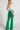 Weezie D Kelly Green Stretch High Waist Trouser Pants have a slight flare hem, hidden front zipper, belt loops, and two back pockets. Featuring a nice streamline silhouette and the color is the perfect bottom pop to go with any neutral or printed top. Comfortably bend and move with the stretch of these pants to compliment your curves. Cotton and Spandex blended pants in Kelly Green.