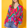 Weezie D. Happy Colors Printed Top sends us on a kaleidoscope of colors. Upscale the look with a pencil skirt & heels for ladies brunch or a more casual look with denim to date night. Dolman drop long sleeves flow with each movement. V-Neckline & relaxed fit. Great quality & feels like silk on your skin 100% Polyester