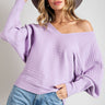 Weezie D. has the perfect lavender Knit V-Neck Sweater Top for you. It's soft and a cozy way to color up your wardrobe right into spring. V-Neckline can be worn off the shoulder. Ribbed fabric detail and long batwing sleeves. Stretch medium knit fabric will fit most. Relaxed Fit 50% Rayon 30% Polyester 20% Cotton